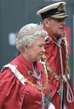 Lady in Red, Queen Elizabeth 2004 OBE ceremony with Prince Philip